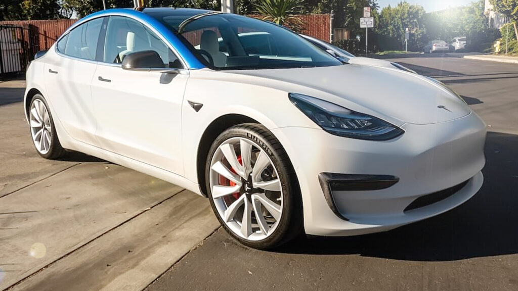 model 3 Tesla with stealth wrap